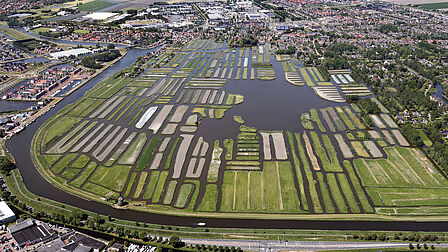Luchtfoto landschapsreservaat Oosterdel naast het Stationsgebied